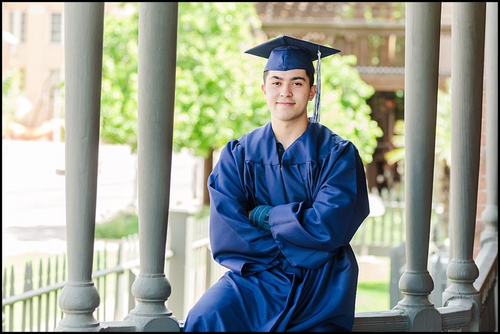 Boy in cap and gown during High School Senior Portrait at Heritage Square in Phoenix