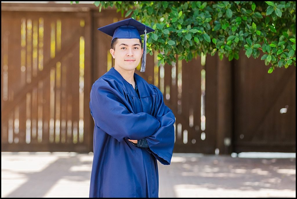 Boy in cap and gown during High School Senior Portrait at Heritage Square in Phoenix