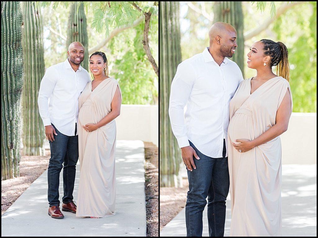 picture of a pregnant African American women in a tan maternity gown and her husband at Scottsdale Civic Center